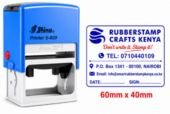 A blue rectangular plastic Shiny S4060 self-inking rubber stamp machine mount with a 60 by 40 mm base plate.